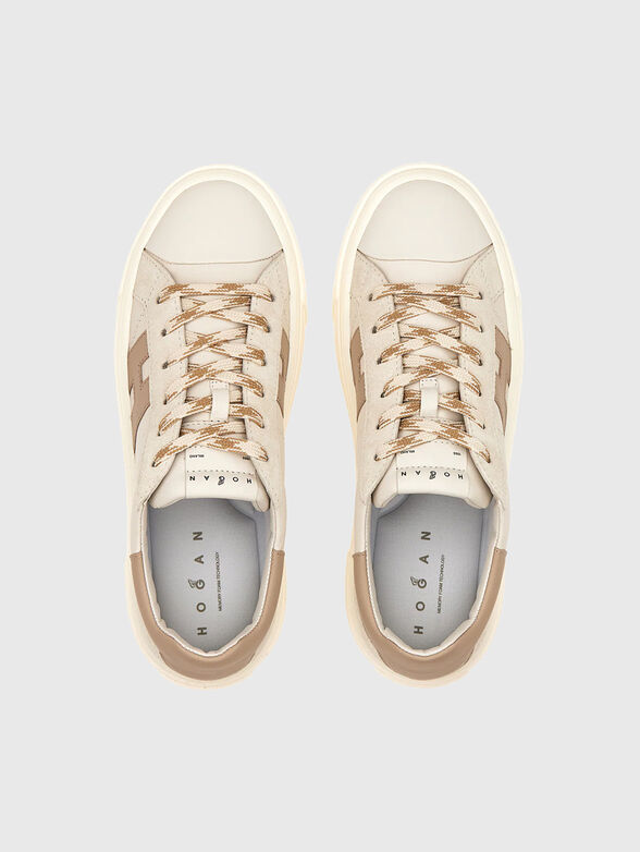 Sneakers with a contrasting logo - 6