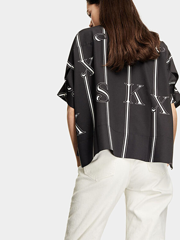 Polo-shirt with contrasting print - 2