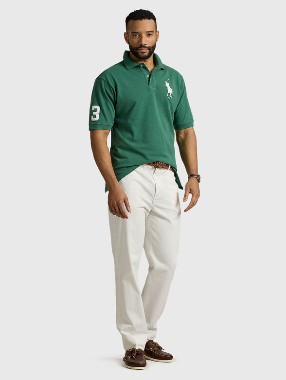 Polo shirt with short sleeves and logo - 1