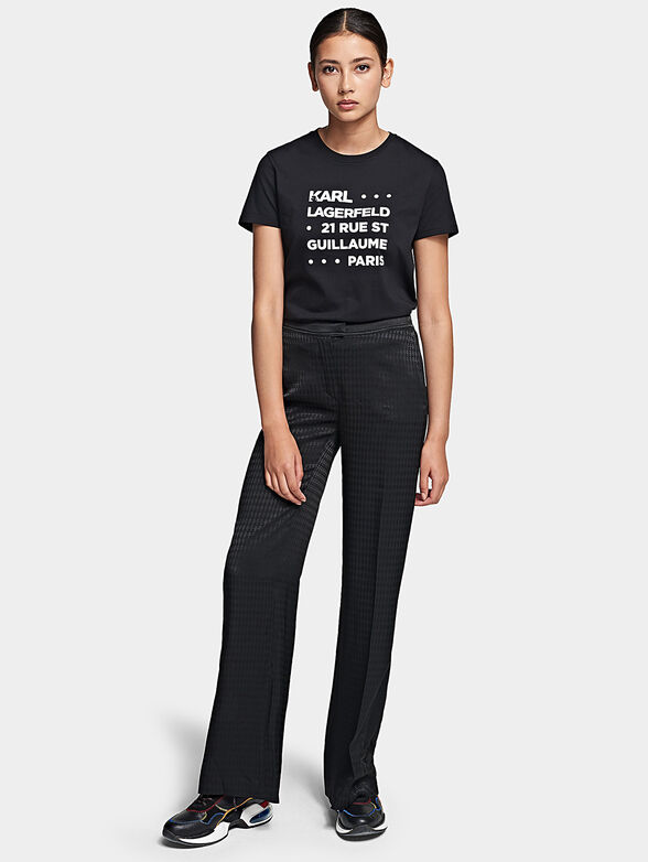 Black pants with logo print - 1