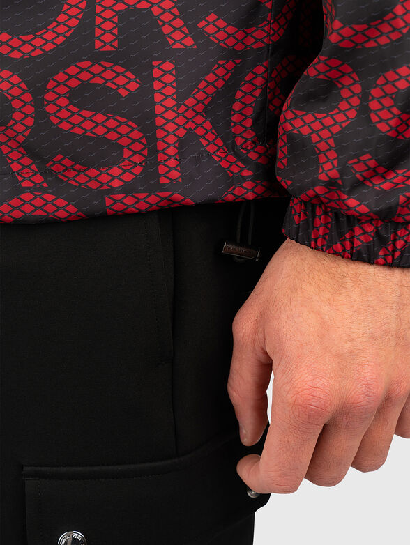 Monogram logo-print jacket  - 6