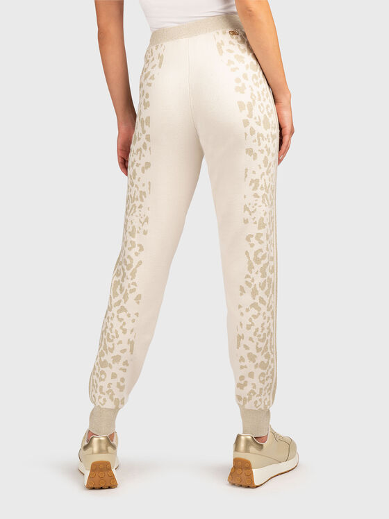 Sports pants with elastic cuffs and animal print - 2