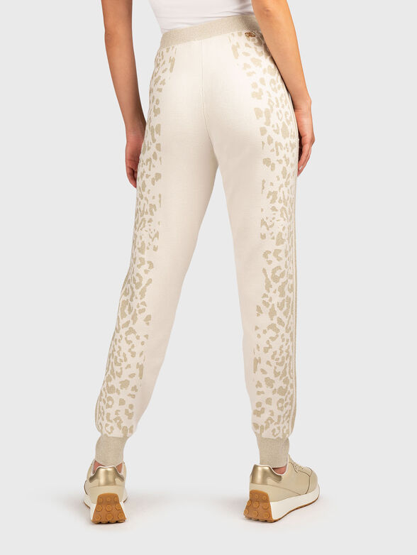 Sports pants with elastic cuffs and animal print - 2