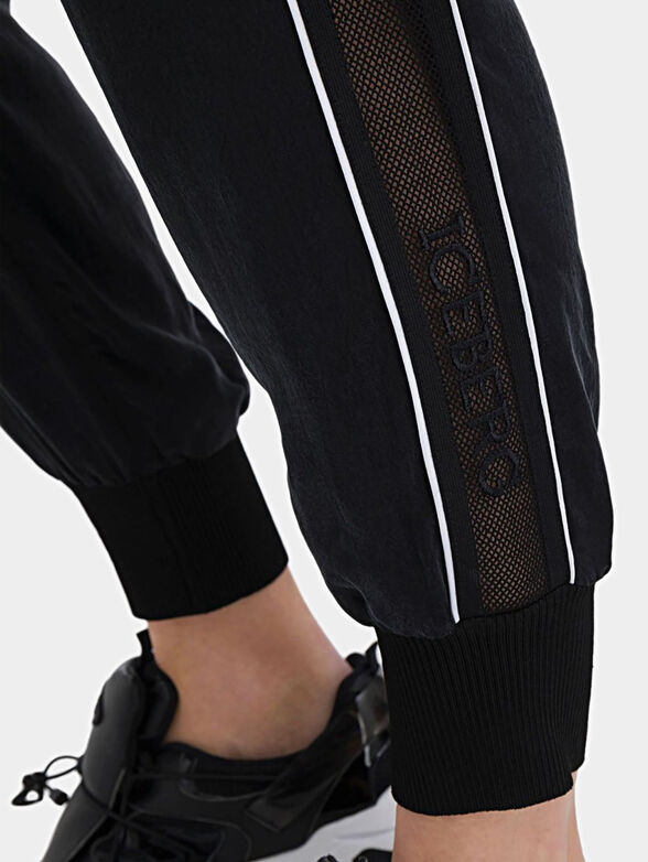 Black sweatpants with mesh sides - 1
