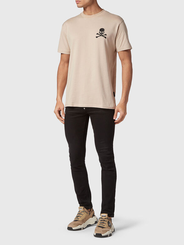 Logo print T-shirt in beige - 2