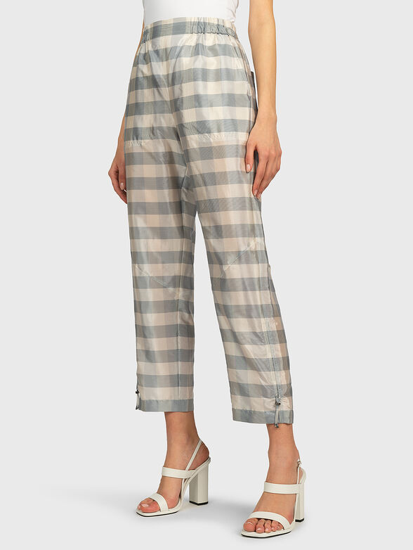 Pants with a checkered print - 1