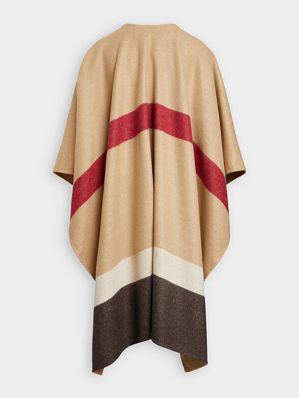 Poncho with accented fastening - 2
