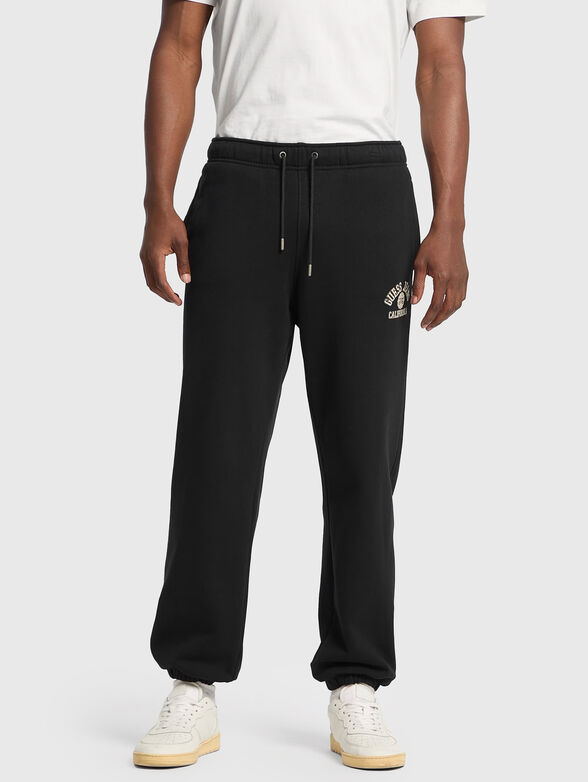 Black sports trousers  with ties at the waist - 1