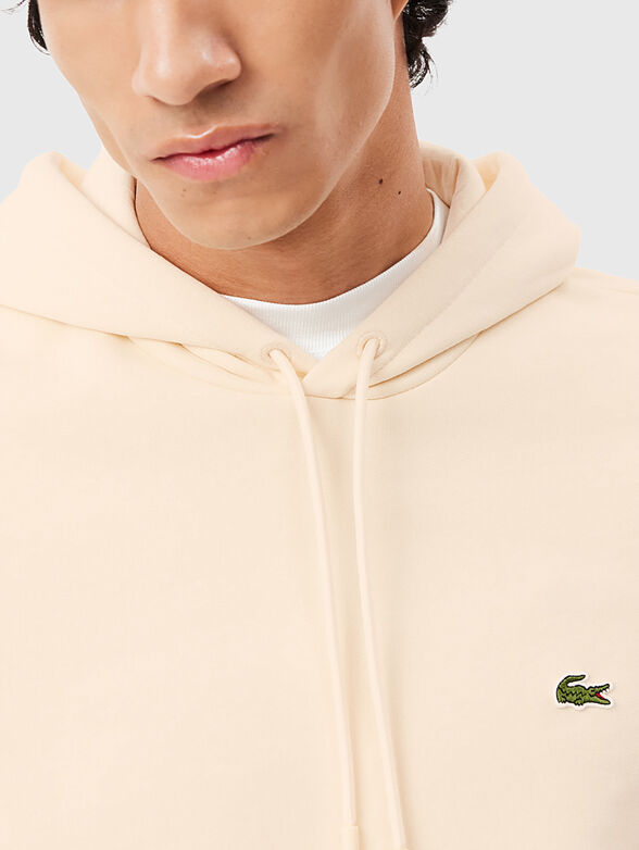 Hooded sweatshirt with logo accent - 4