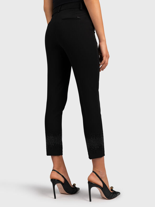 Black pants with appliqued rhinestones - 2