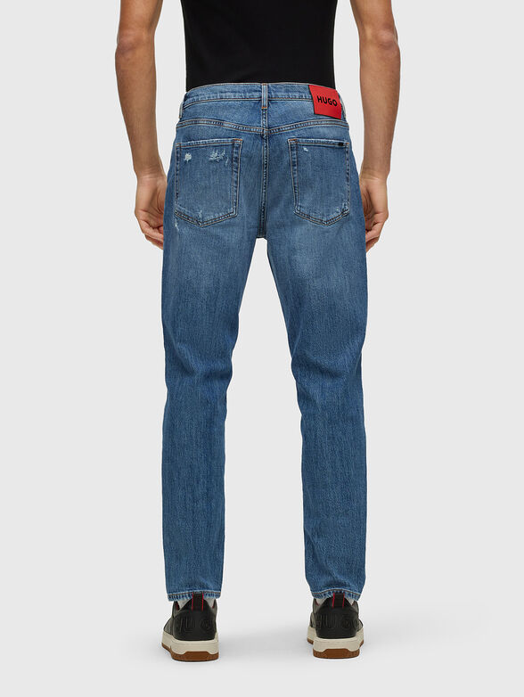 Blue jeans with distressed effect - 2