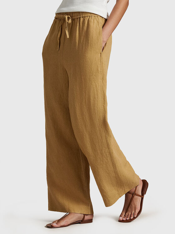 Linen trousers in beige color - 1
