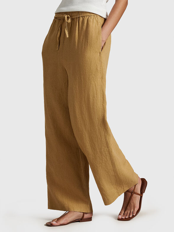 Linen trousers in beige color - 1