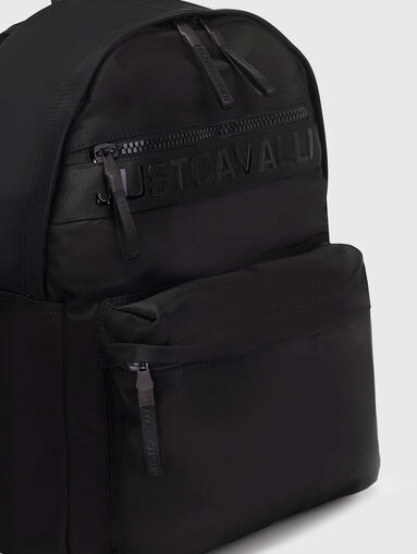 Black backpack with embossed logo detail - 4