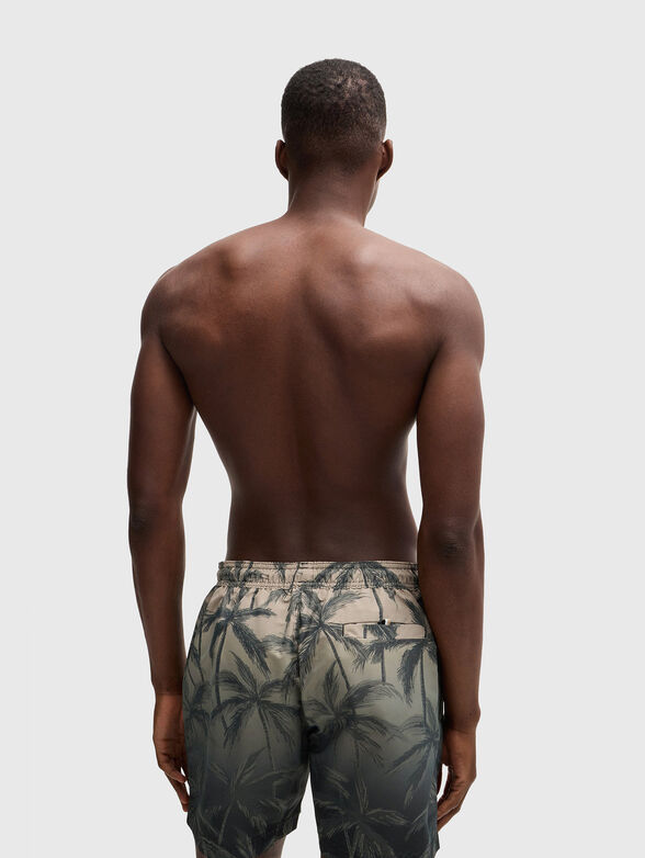 Beach shorts in blue color with print  - 2