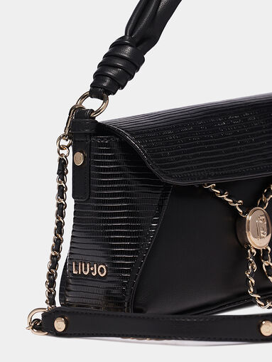Black handbag with textured details - 5