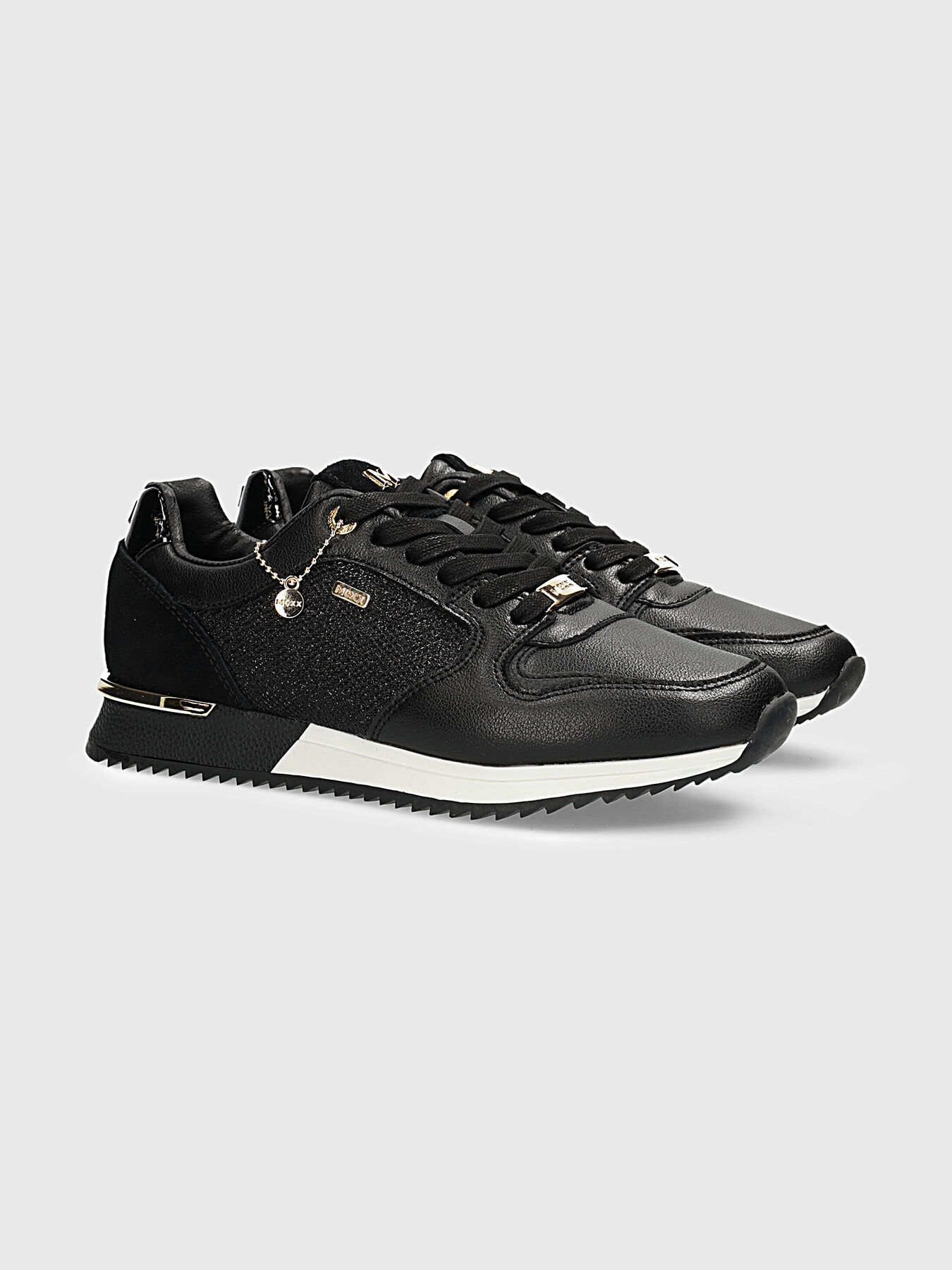 Black shoes with gold accents store