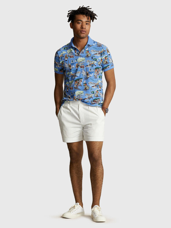 Blue polo shirt with multicolour print - 2