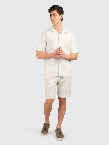 Cotton shorts with floral motifs - 5