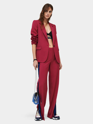 Trousers with flared legs with slits - 5