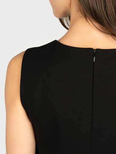 Black dress with contrasting details - 3