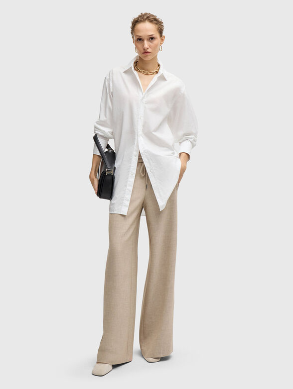 Beige trousers ties at the waist - 4