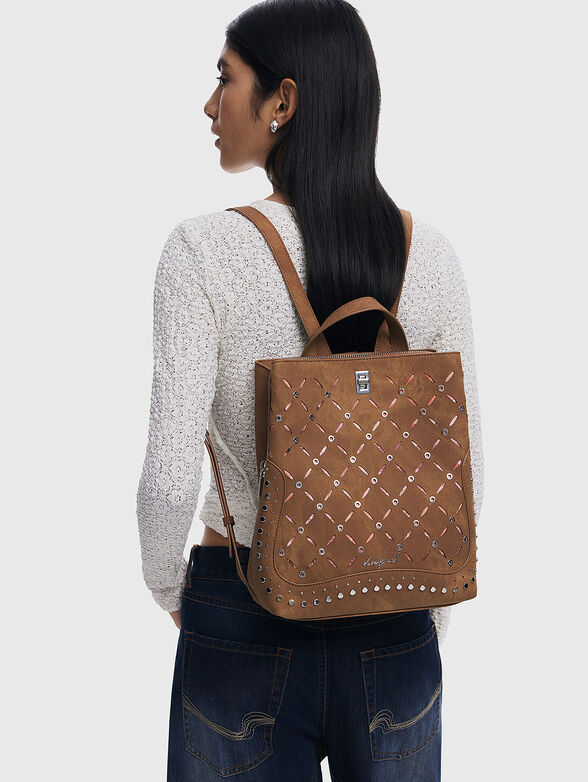 Backpack with perforations and studs - 2