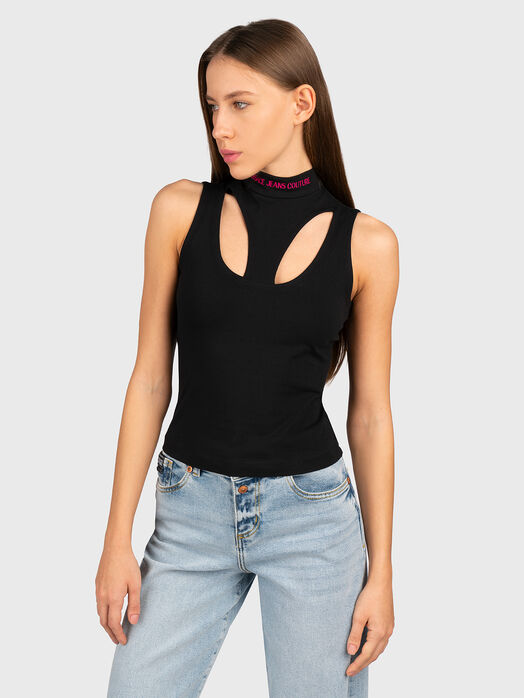 Black top with cut out details and accent back