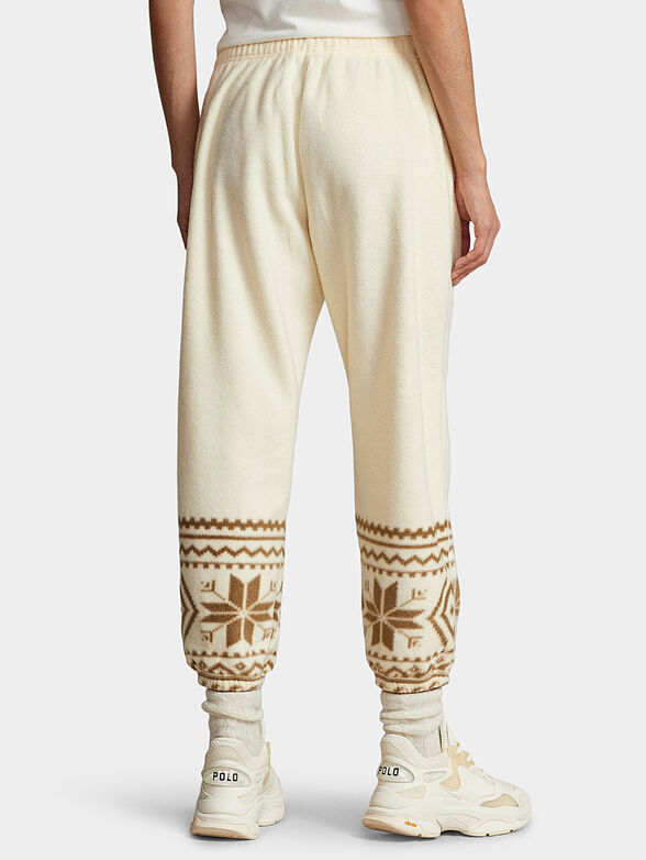 Sports pants with contrasting print - 1