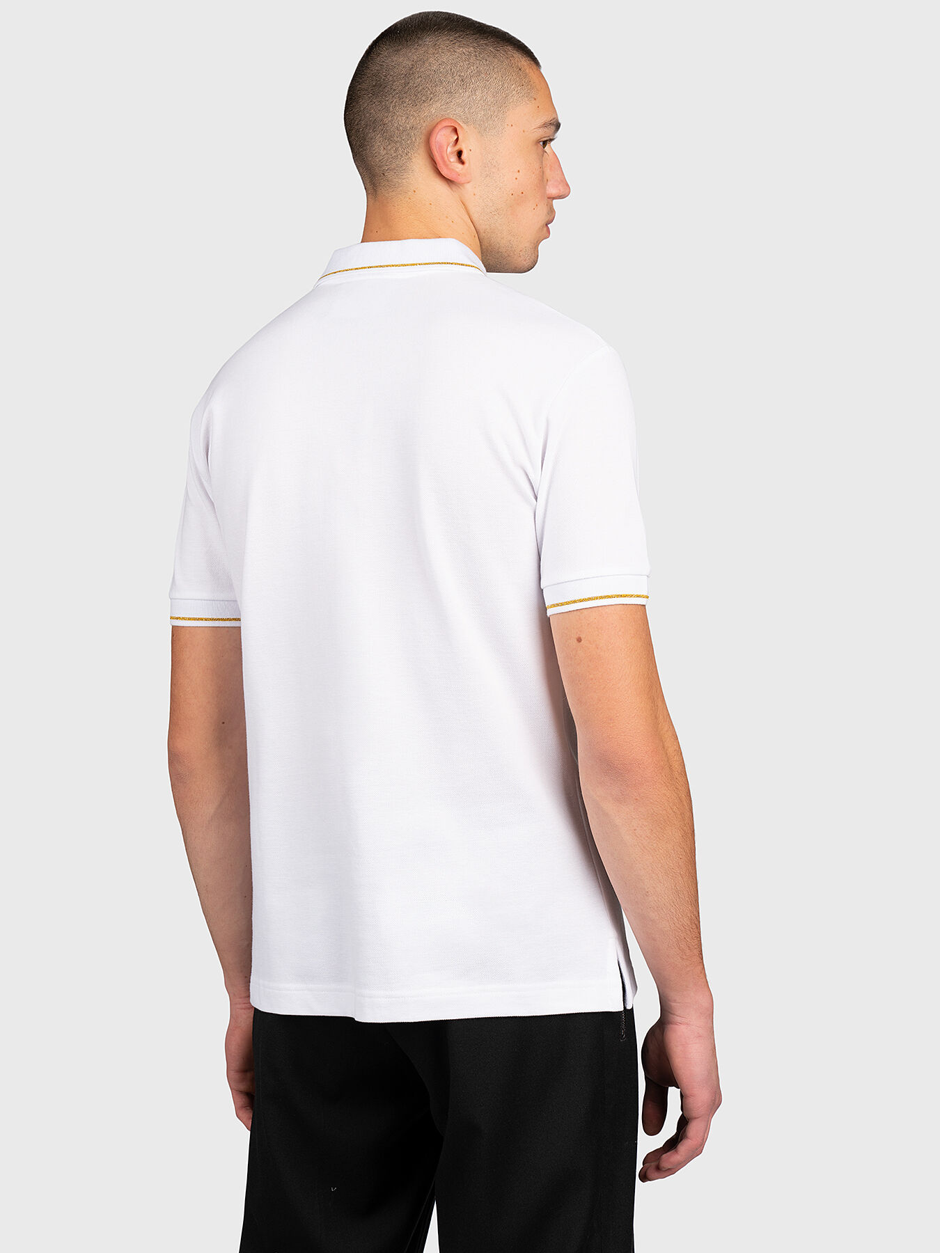 White polo-shirt with gold logo embroidery brand VERSACE