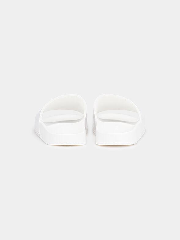 Slides in black with logo detail - 3