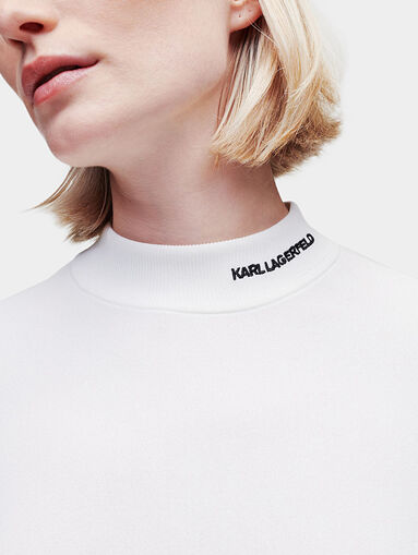 Mock neck sweater in black - 3