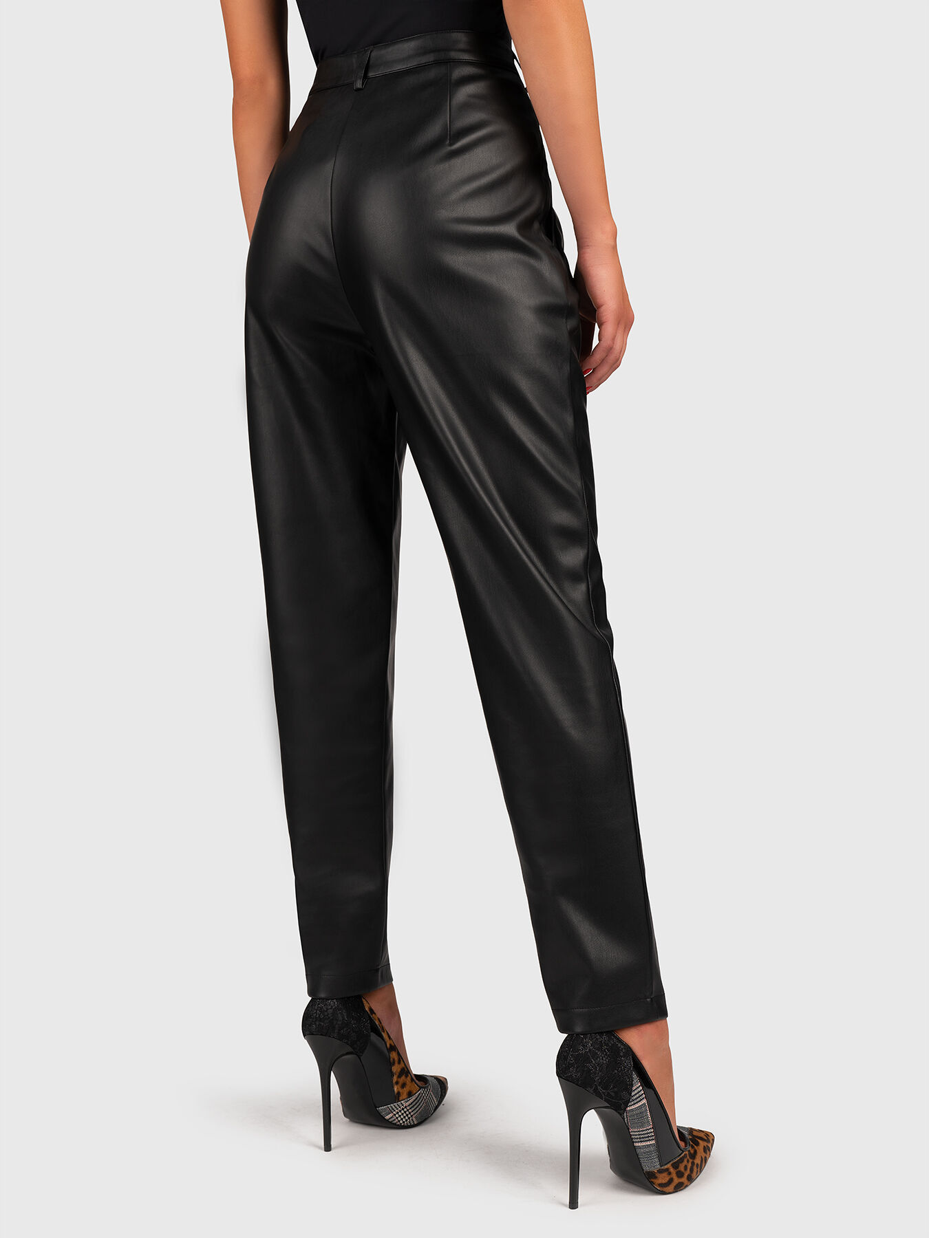 Black faux leather pants brand LIU JO — Globalbrandsstore.com/en
