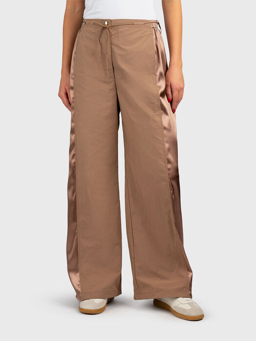 Sports pants with adjustable hem 