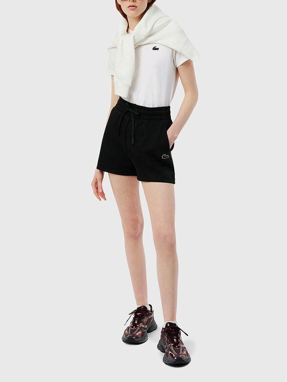 T-shirt is pink color with logo - 2