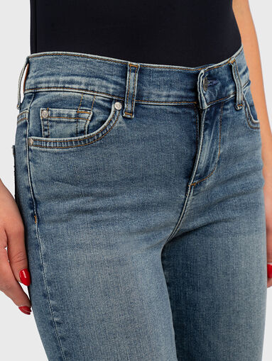 Light blue jeans with washed effect  - 4