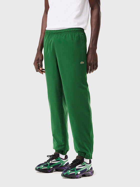 Зелен спортен панталон с лого  - 1