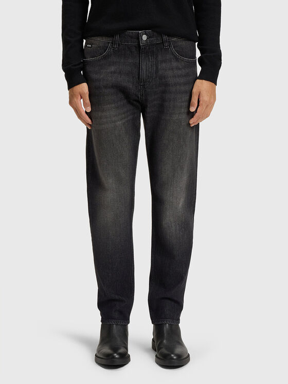 Jeans with washed effect and logo - 1