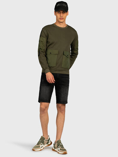 Green sweatshirt with pockets - 1
