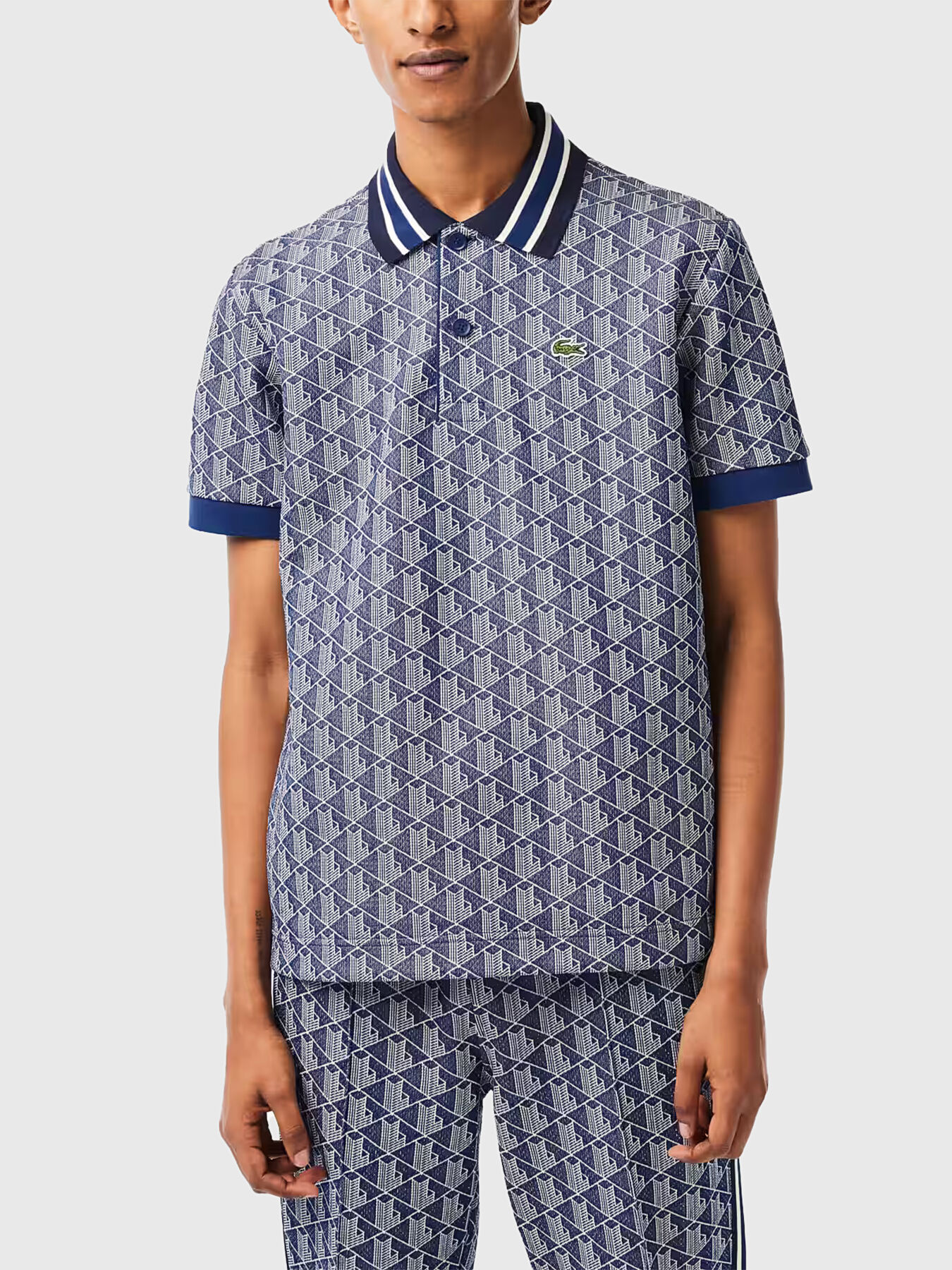 Polo lacoste motif store