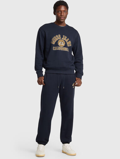 Black sports trousers  with ties at the waist - 5