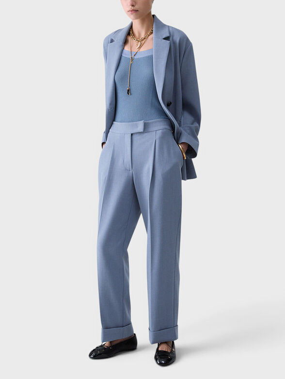 Blue trousers made of melange fabric - 4