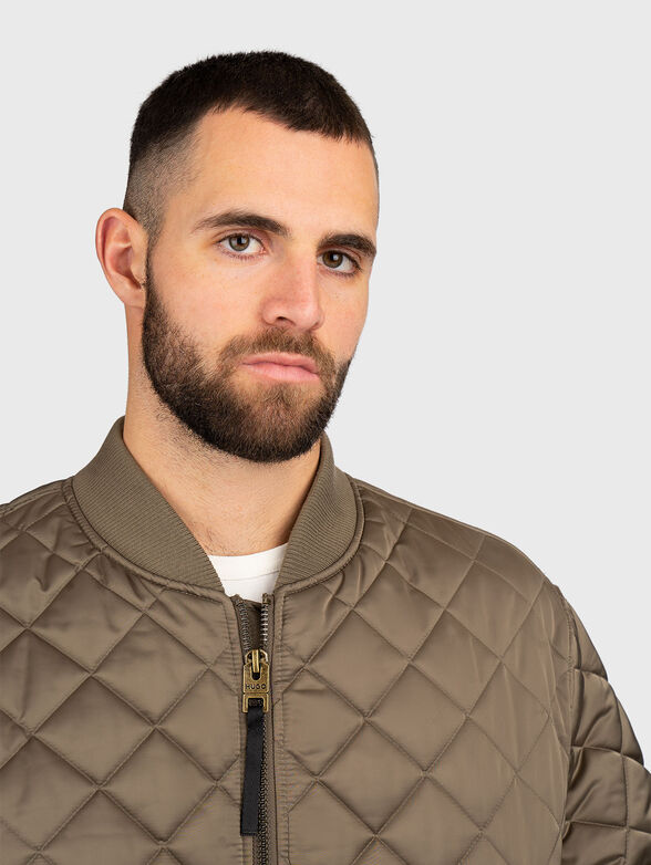 Quilted jacket with side pockets - 5