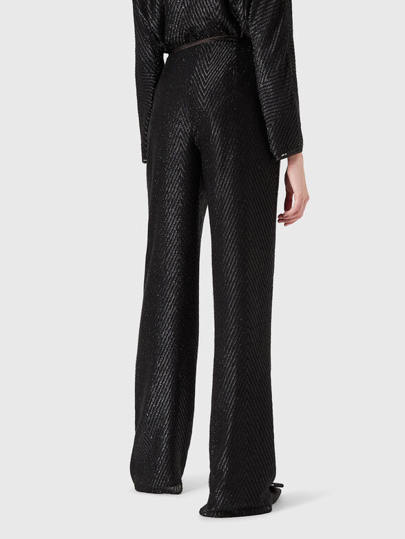 Textured trousers with wide legs - 2