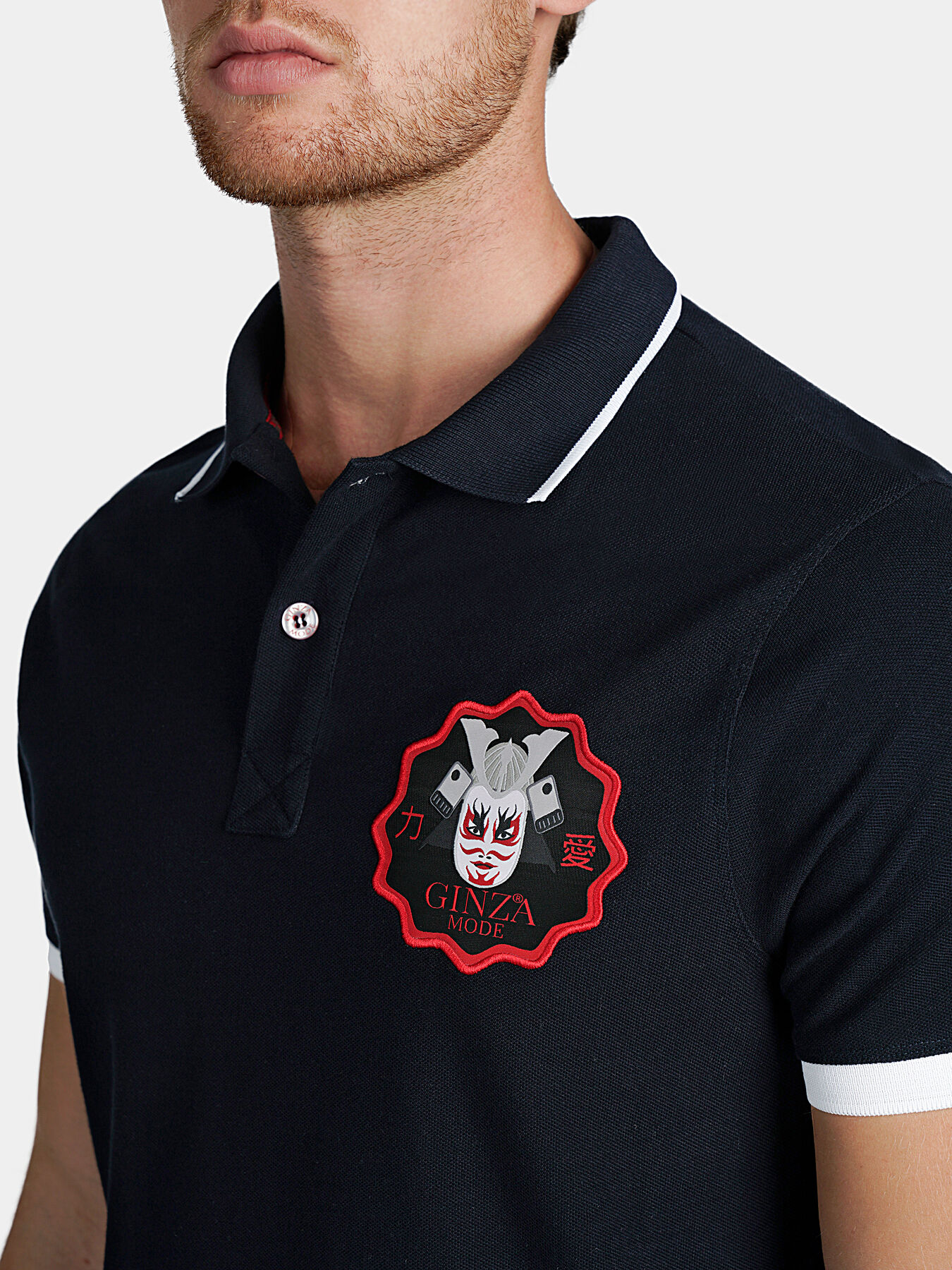Cotton polo-shirt with contrasting embroideries brand GINZA