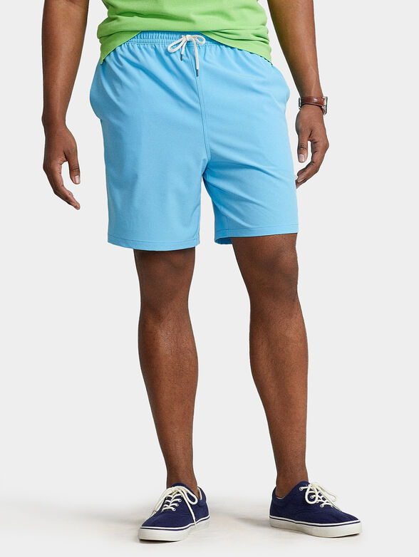 Swim trunks in blue color - 0
