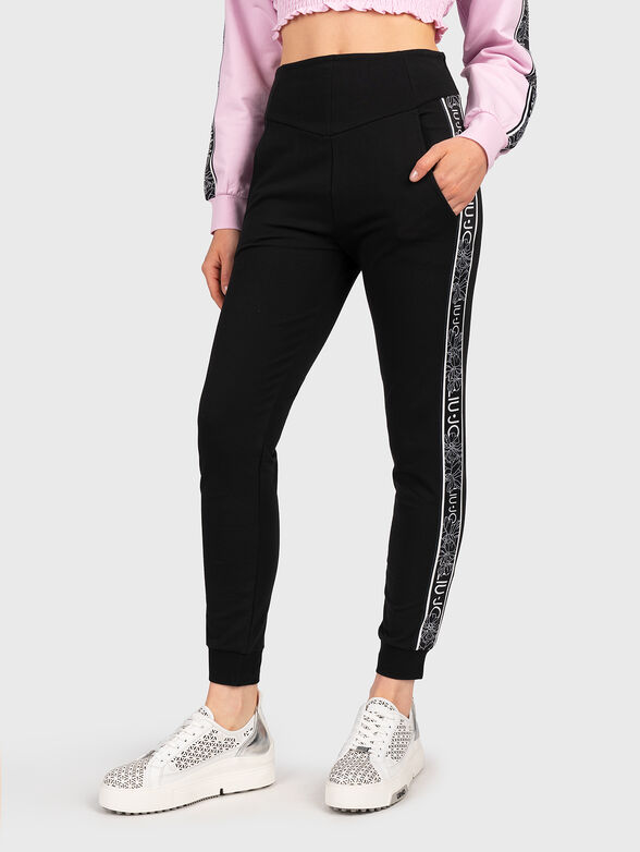 Black trousers with logo straps - 1