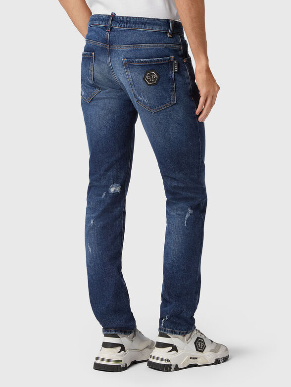 Blue jeans with rips - 1