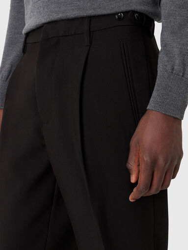 Slim trousers with cuffs and logo detail - 4