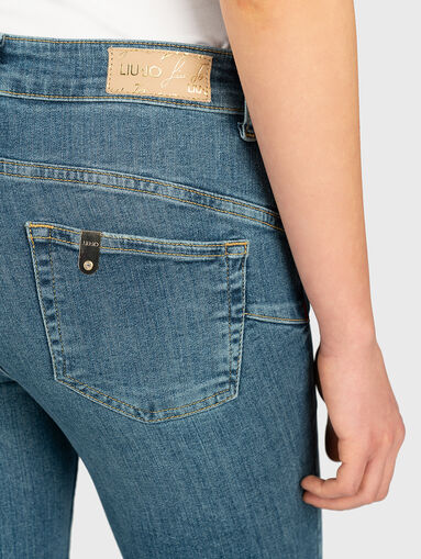 Skinny jeans with belt bag - 5